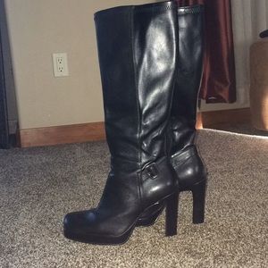 High heeled Victoria’s Secret black leather boots